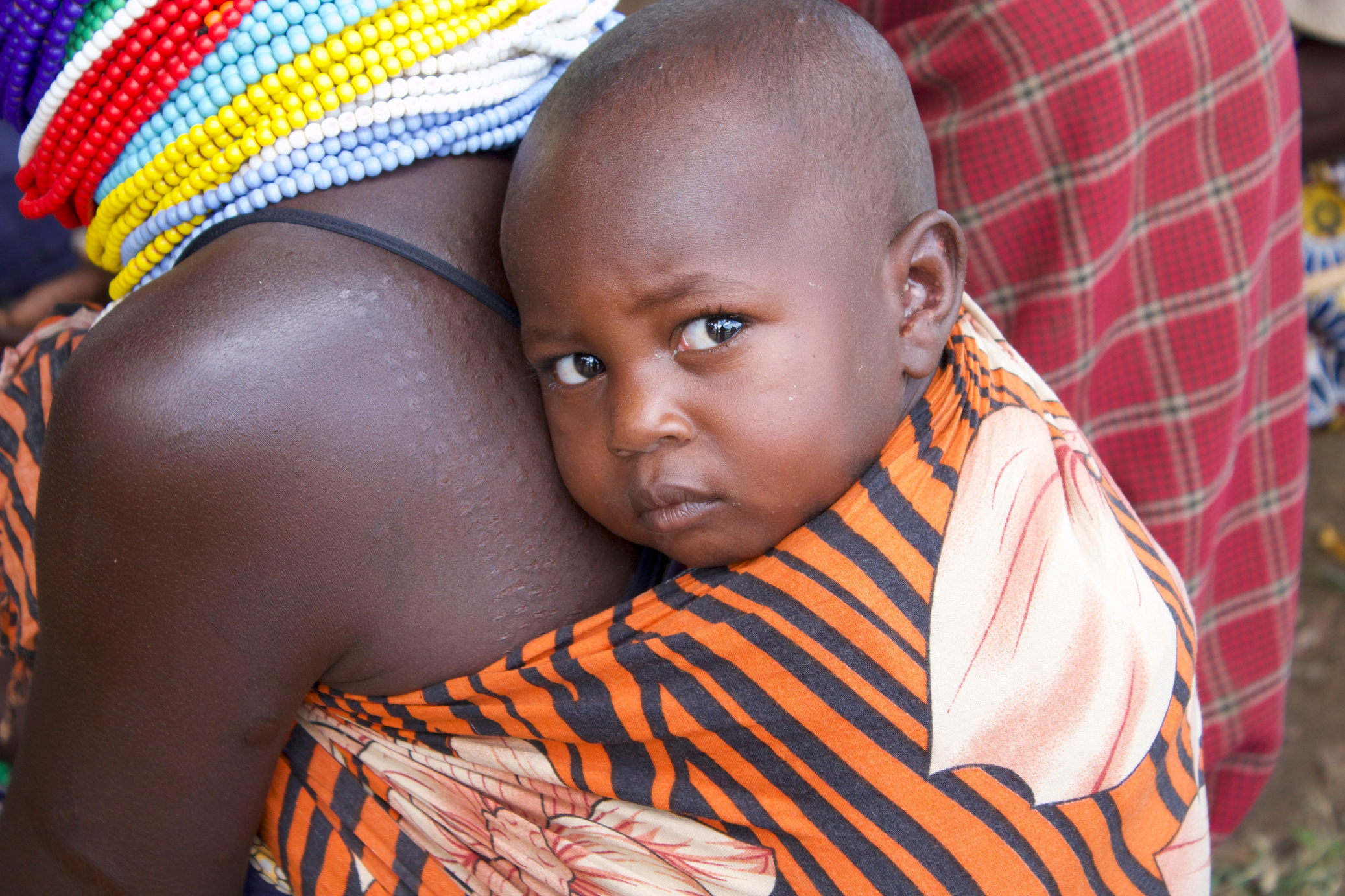 Niño africano sonriendo - Impacto de OLA World en comunidades
